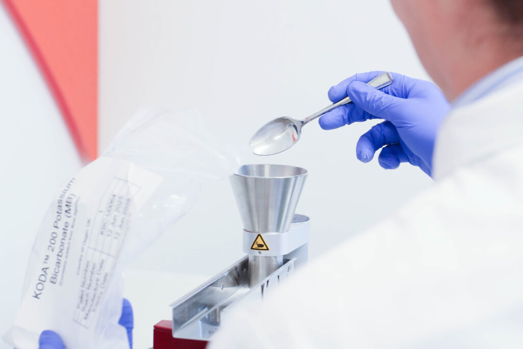 Chemist assessing raw materials